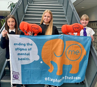 Pupils with banner